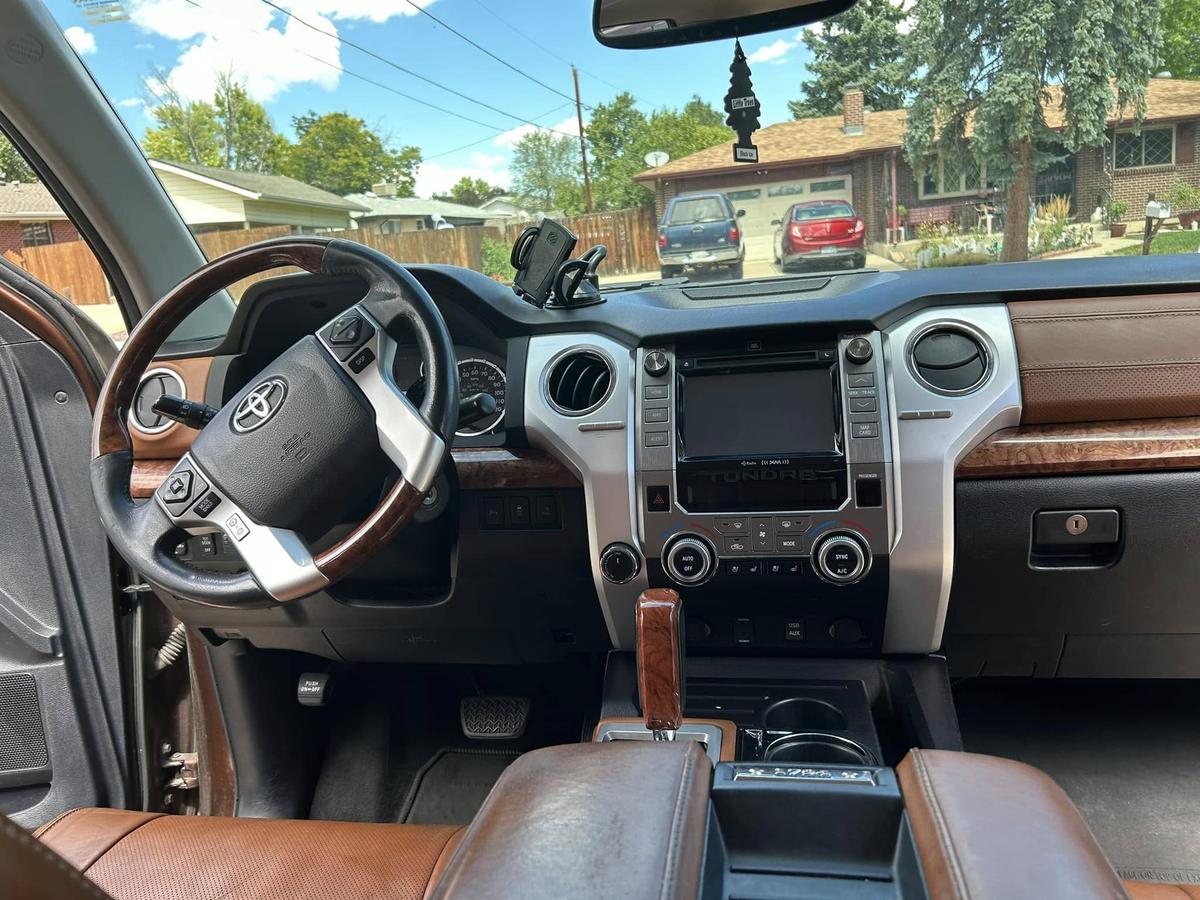 Inside: the dash and saddle leather console of the same Tundra
