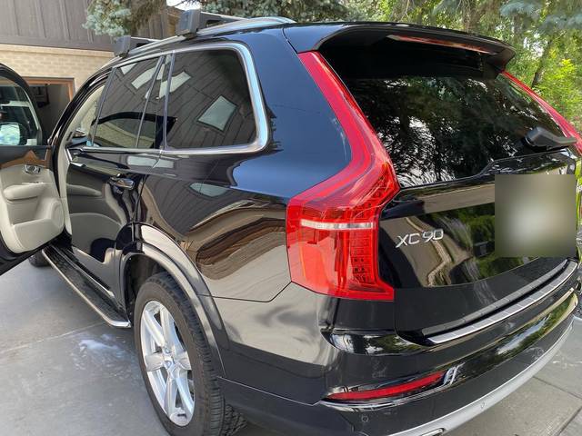 A black Volvo XC90 from the rear